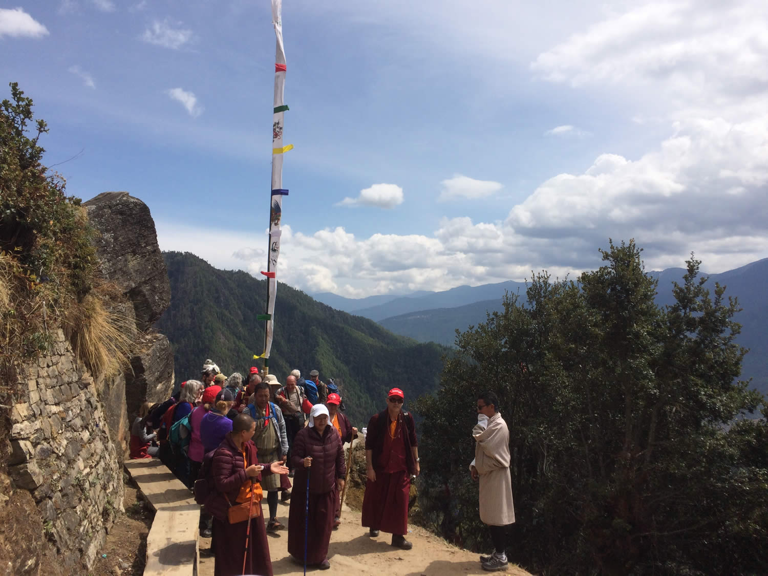 Rinpoche and group descending from Taktsang.