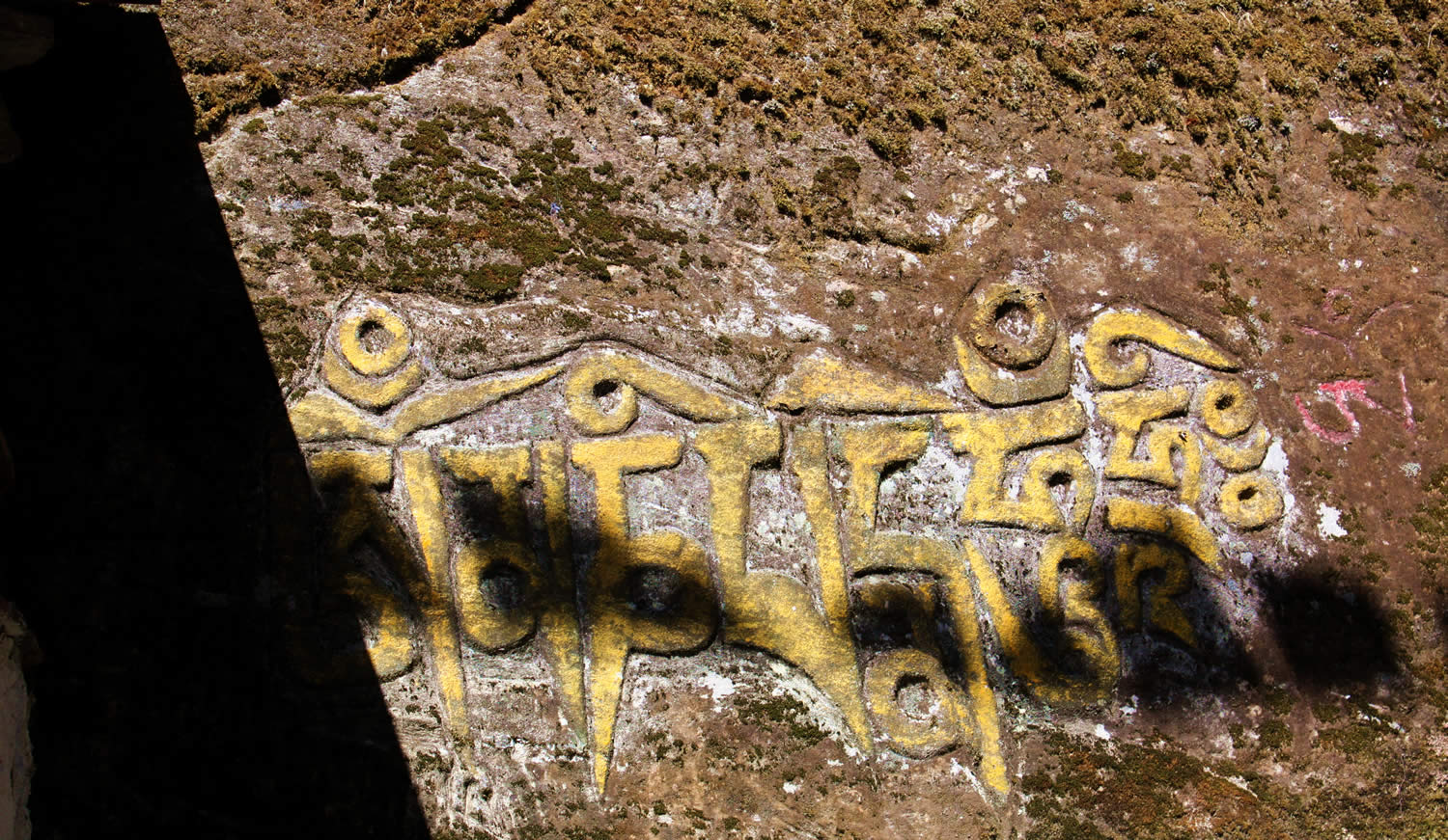 Mantra carved into rock near Longchenpa's retreat cave.