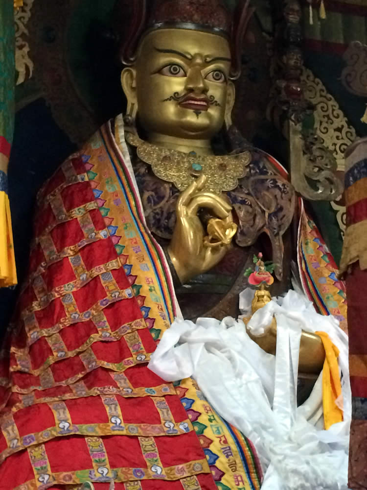 Statue of Guru Rinpoche in Tharpaling Monastery shrine room.