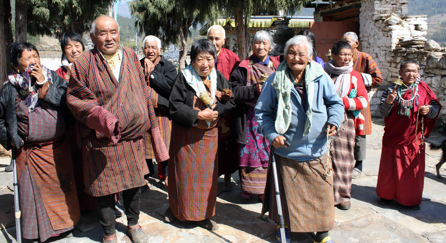 Townspeople arrive to request blessings from Jetsün Khandro Rinpoche.
