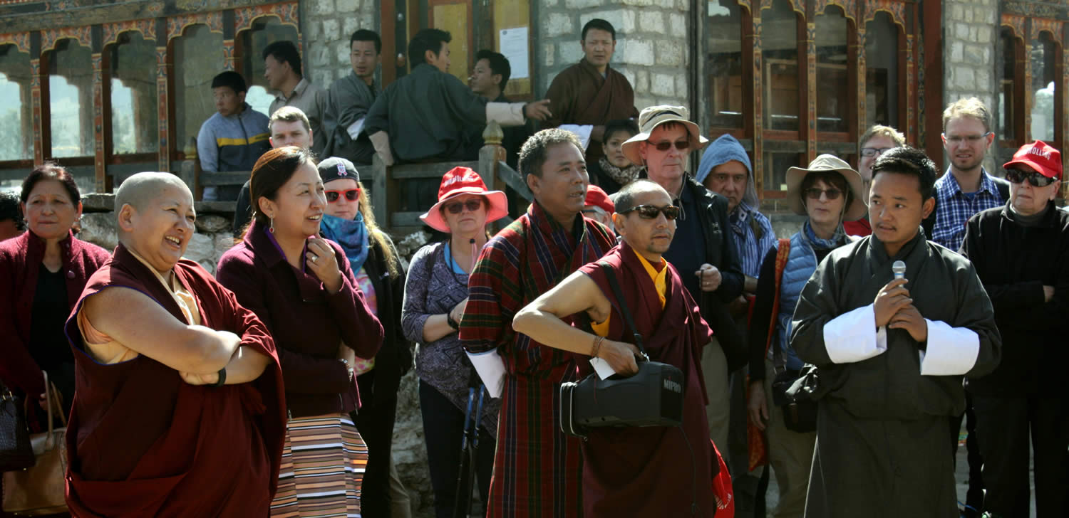 One of the guides shares a story as Rinpoche, Jetsunla and Tenpa Choepel look on..