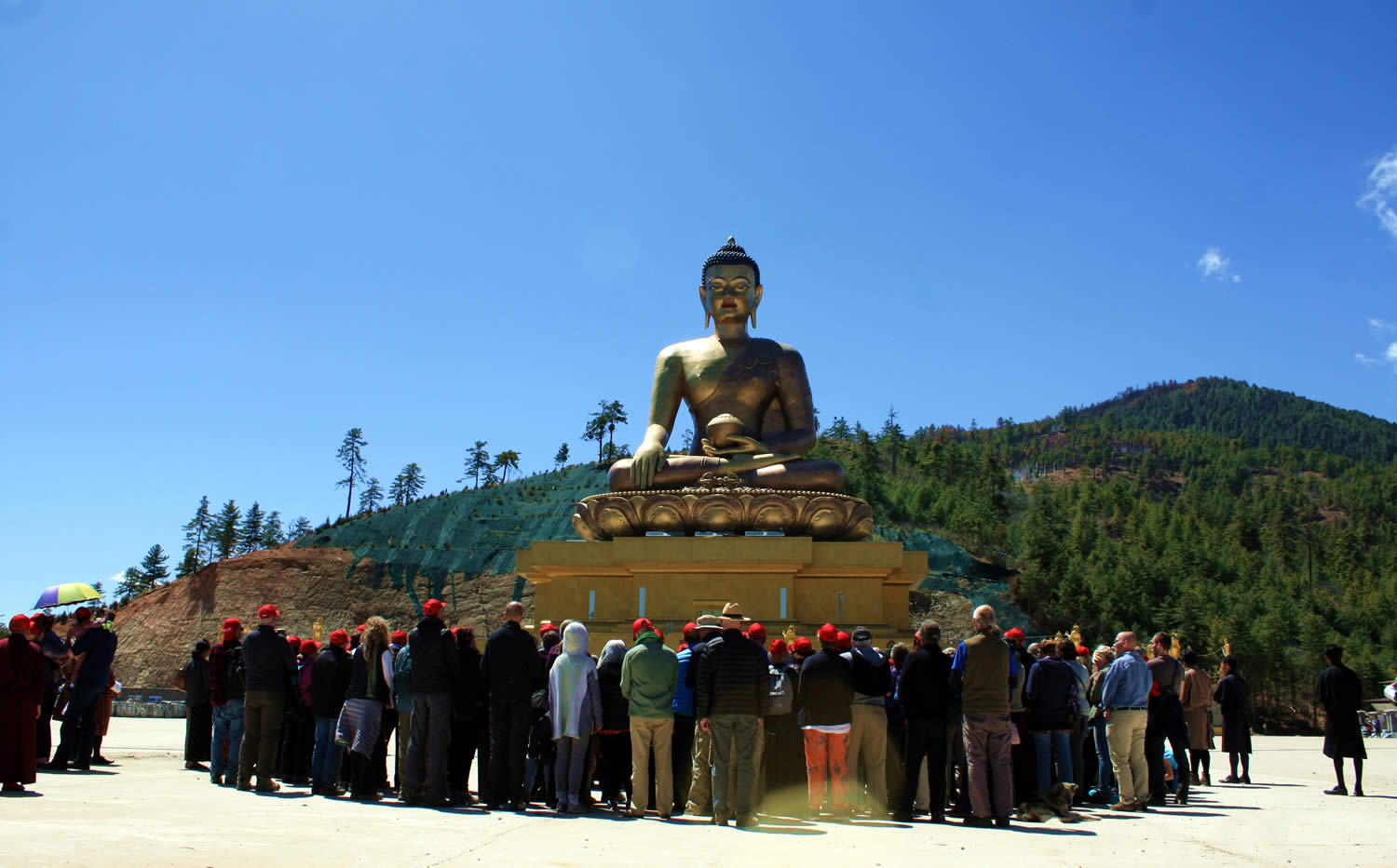 Group members admiring the 169 foot tall Buddha Dodenma.