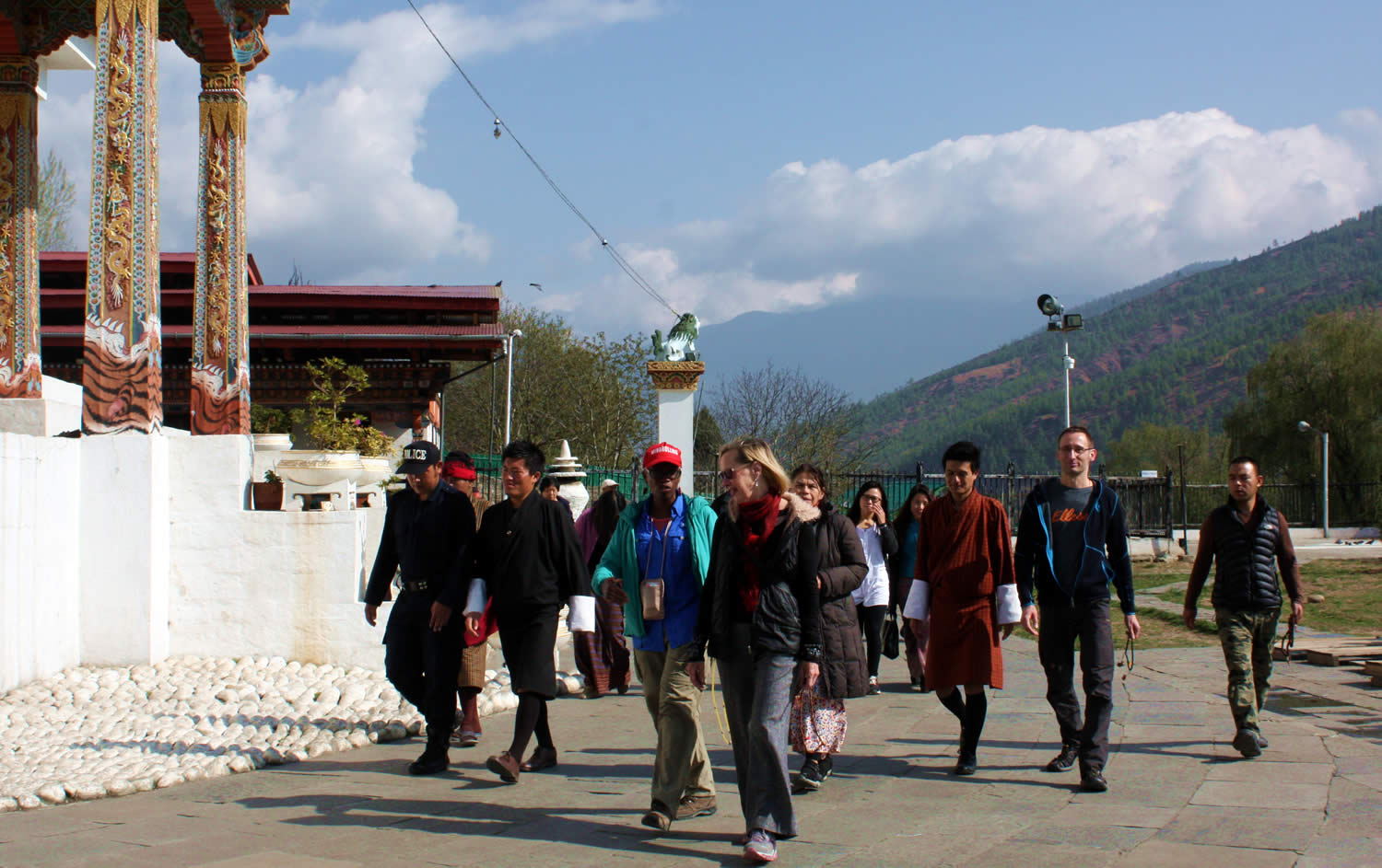 Group members join the locals in circumambulating the chorten.