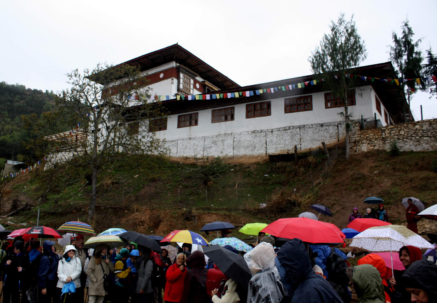 Group members gather below Kila Gompa at the foot of the Drak Karpo site.