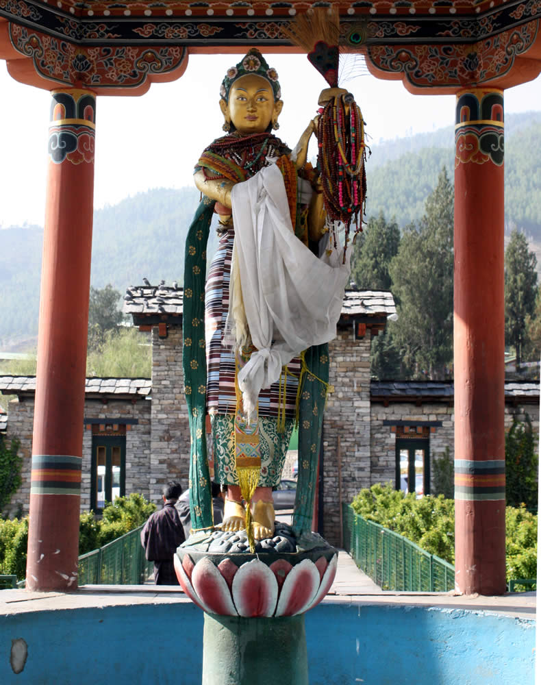 Statue of an offering goddess at the entrance to the grounds of the Memorial Chorten in Thimphu.